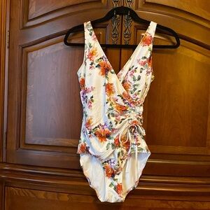 Niptuck white floral patterned one-piece bathing suit, size 6.
